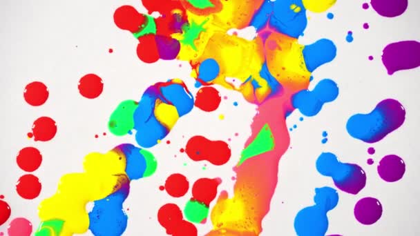 Top View Various Colors Oil Paints Dripping White Paper Spinning — Stock Video