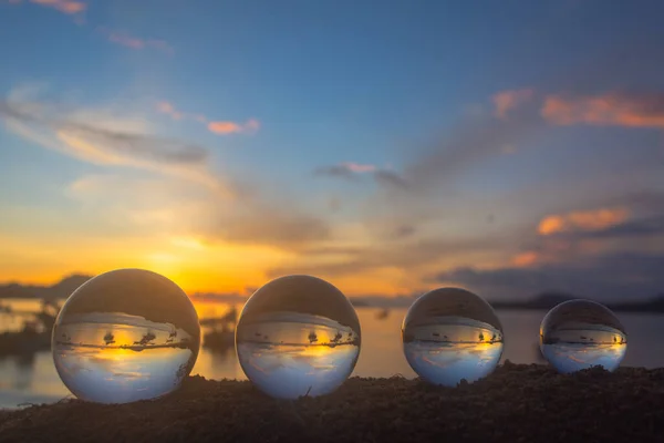 view of the sea and sky inside crystal ball. The natural view of the sea and sky are unconventional and beautiful.