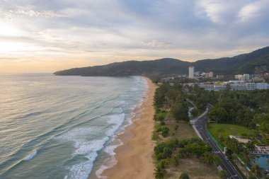 aerial view beautiful sunset above the ocean in coconuts channel at Karon beach.scenery sunlight on the horizon.Scene of colorful light in the sky background.sea sports environment background.