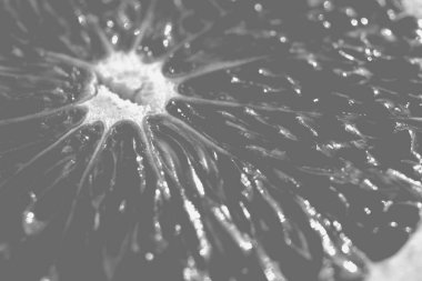 Siyah ve beyaz sulu portakal dolgulu arka plan. Citrus meyve dokusu. Vitamin lezzetli..