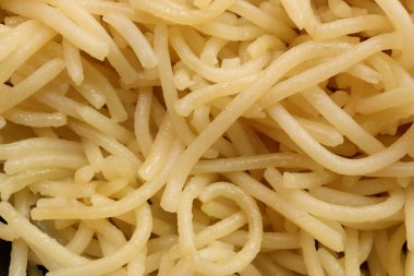 Pişmiş makarna. Spagetti dokusunu dolduruyorum. Makarna arka planı.