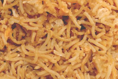 Spagetti dokusunu dolduruyorum. Makarna arka planı. Pişmiş makarna.