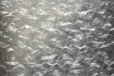 Kabarcık desenli koruyucu selofan. Hava sivilceleri plastik arka plan.