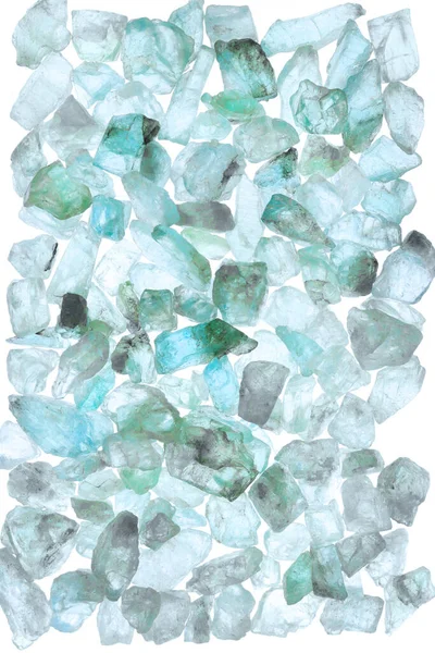 Apatite heap jewel stones texture on white light isolated background.