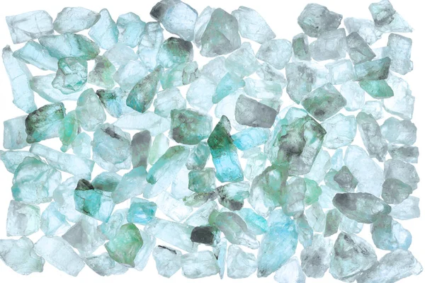 Apatite heap jewel stones texture on white light isolated background.
