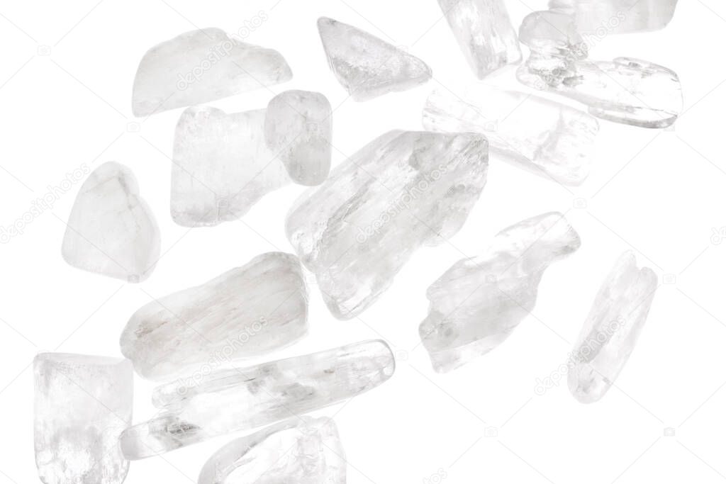 Clear kunzite heap up jewel stones texture on white light isolated background