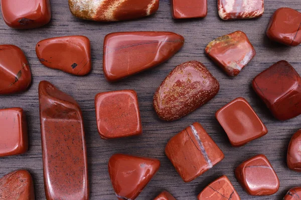 Red Jasper Rare Jewel Stones Texture Brown Varnished Wood Background — Stok fotoğraf