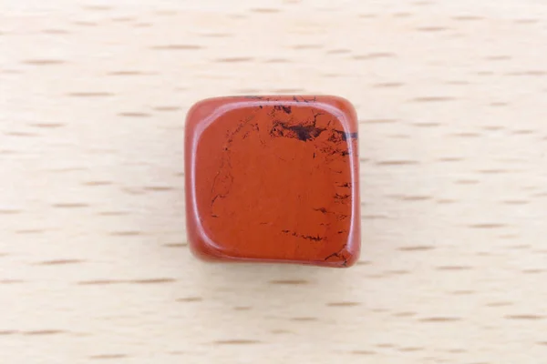 Red Jasper Jewel Stone Texture Light Varnished Wood Background Macro — Φωτογραφία Αρχείου