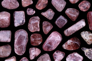 Strawberry quartz rare jewel stones texture on black background