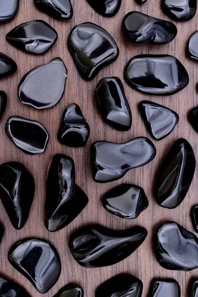 Obsidian Rare Jewel Stones Texture Brown Varnished Wood Background — Stock Photo, Image