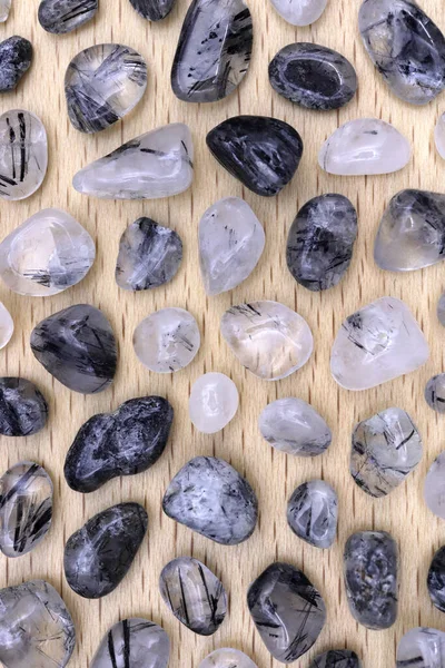 Tourmalinated Quartz Rare Jewel Stones Texture Light Varnished Wood Background — Stock Photo, Image