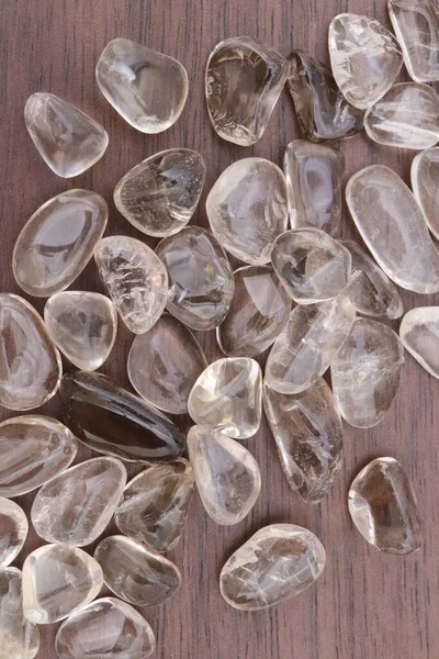 Smoky Quartz Heap Jewel Stones Texture Brown Varnished Wood Background — Stock Photo, Image