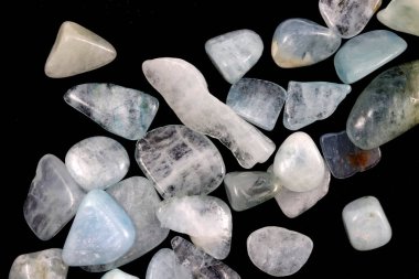 Aquamarine heap up jewel stones texture on black background