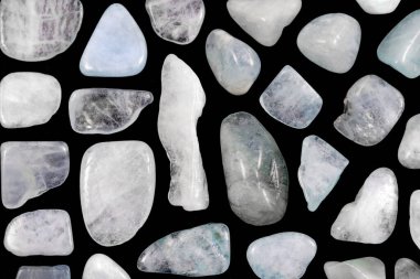 Aquamarine rare jewel stones texture on black background