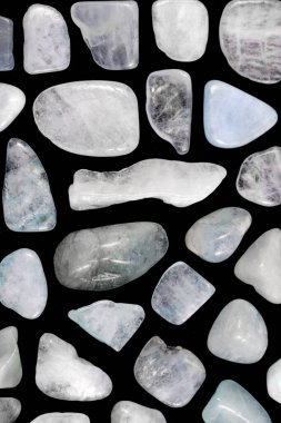 Aquamarine rare jewel stones texture on black background