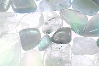 Aquamarine heap jewel stones texture on white light background