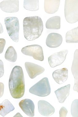 Aquamarine rare jewel stones texture on white light isolated background