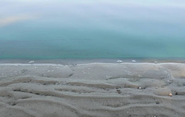 The river turns into the sky, sand waves — Stock Photo, Image