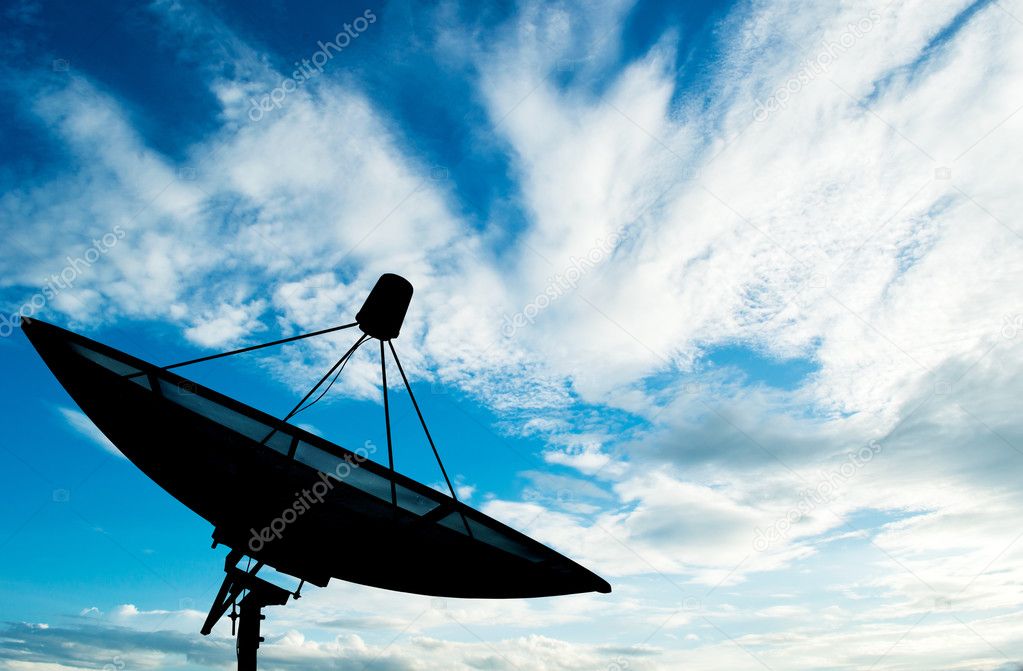 Satellite dish transmission data on backgroundl blue sky