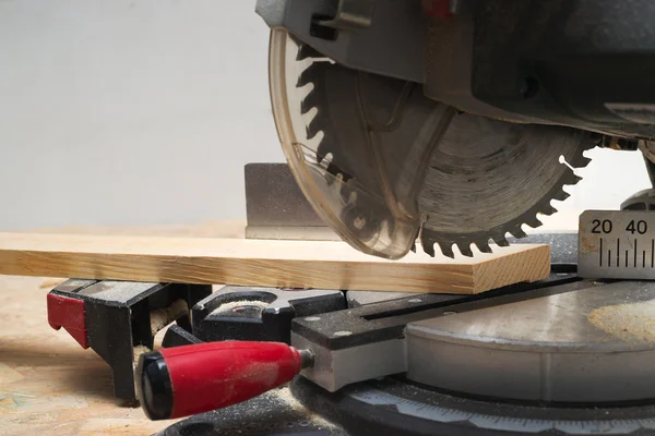 Carpenter tools on wooden table with sawdust. Circular Saw. — Stock Photo, Image