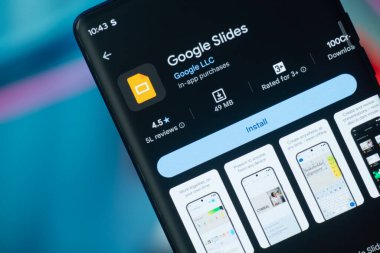 Dhaka, Bangladeş 26 Aralık 2025: Google Slayt uygulaması logosu telefon ekranı resmi.