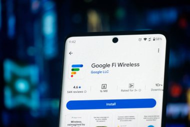 Dhaka, Bangladeş 26 Aralık 2025: Google Fi Kablosuz uygulamasını görüntüleyen ve yanında kulaklıklar bulunan bir telefon