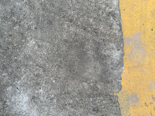 Concrete road with yellow stripe — Stock Photo, Image