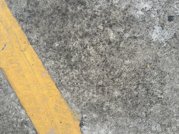 Concrete road with yellow stripe — Stock Photo, Image