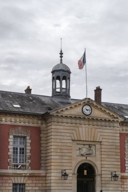 French flag at the entrance of a town hall in France