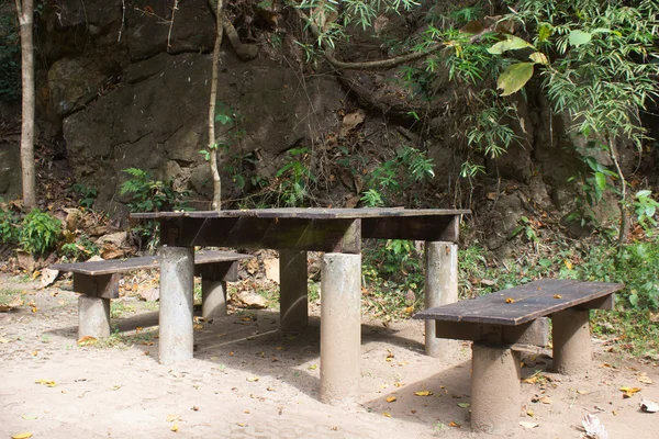 Wooden table outdoor in garden — Stock Photo, Image