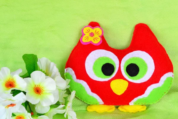 Cute red owl toy is sewn of felt. Home decor — Stock Photo, Image