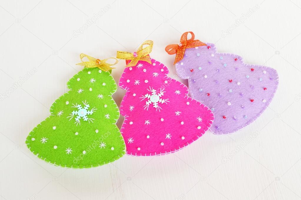 Christmas felt Christmas tree ornaments. Green, pink and purple Christmas tree toys