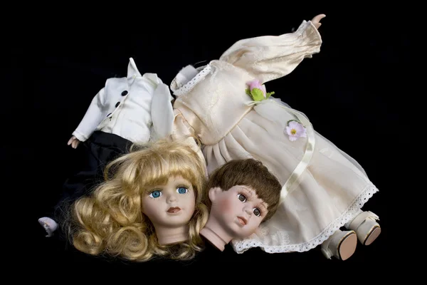 Girl and Boy Doll broken wedding body on black background — Stock Photo, Image