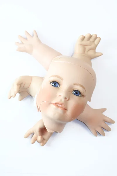 Broken Doll Head and Body Parts on White Background — Stok Foto