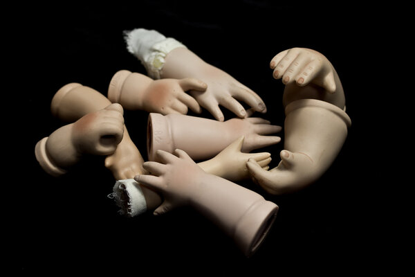 Doll Hands Body Parts on Black Background
