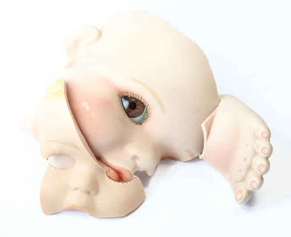 Close Up of Broken Doll Heads On White Background — Stock Photo, Image