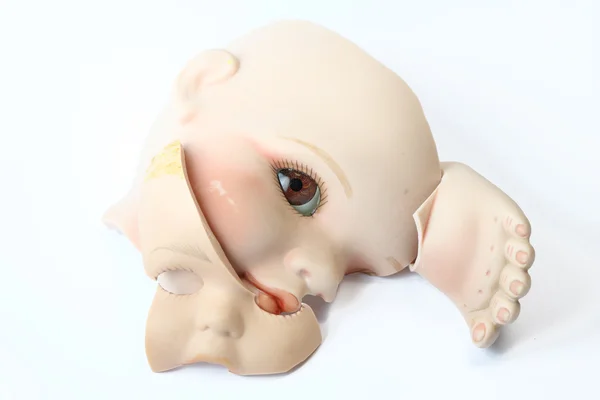 Close Up of Broken Doll Heads On White Background — Stock Photo, Image