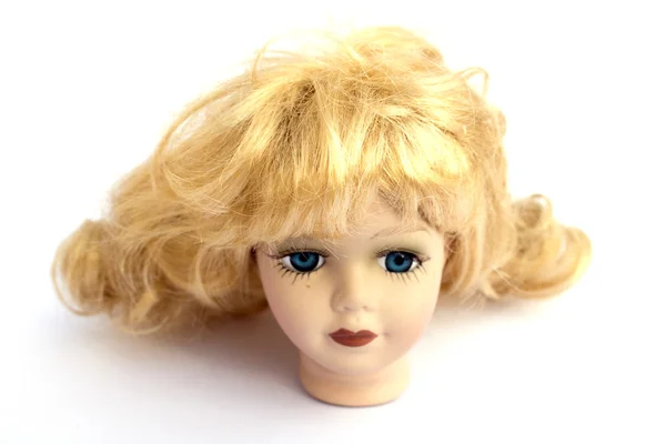Menina boneca cabeça no fundo branco — Fotografia de Stock