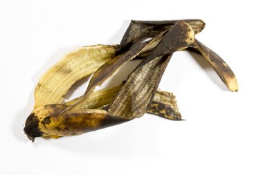 Olgun muz ve deri üzerinde beyaz arka plan üzerinde