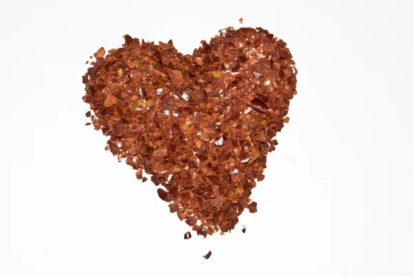 Red Chilli Spice Flakes em fundo branco — Fotografia de Stock