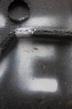 Sıkıntılı Tipografide Yazılı Bir Harf Bulundu