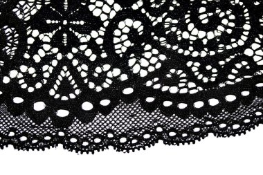 Beyaz bir arkaplanda güzel bir dantel örgü.