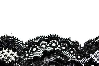 Beyaz bir arkaplanda güzel bir dantel örgü.