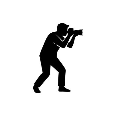 Fotoğrafçı kamerayı çekiyor.