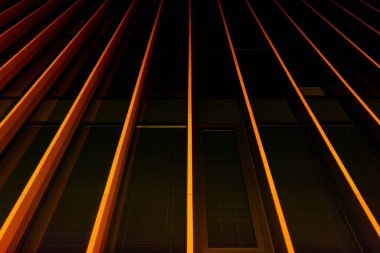 Modern İnşaat Cephesi Hatları. Orange Night Lights Deseni. Soyut Mimari