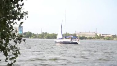 The yacht floats on the water