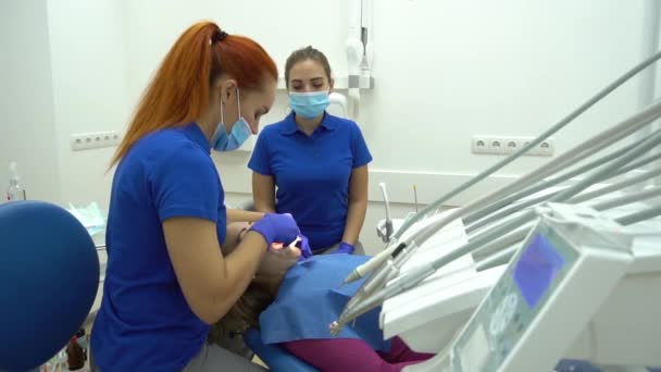 Slow Motion Young Woman Visit Dentistry Clinic Professional Teeth Treatment — Stockvideo