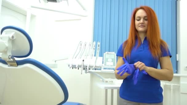 Slow Motion Doctor Protective Blue Uniform Wears Blue Glove — Stock Video