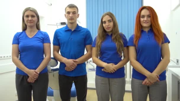 Slow Motion Group Dentists Standing Dental Office Looking Camera — Vídeo de Stock