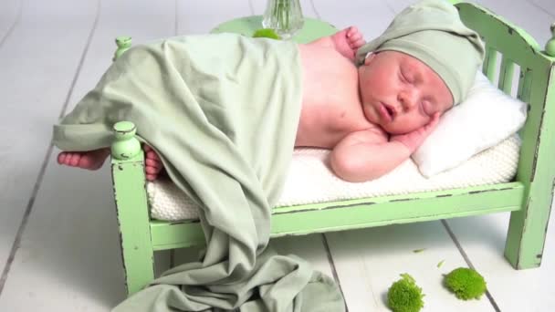 Beautiful Newborn Baby Girl Lying Stylized Green Bed Cute Portrait — Stockvideo